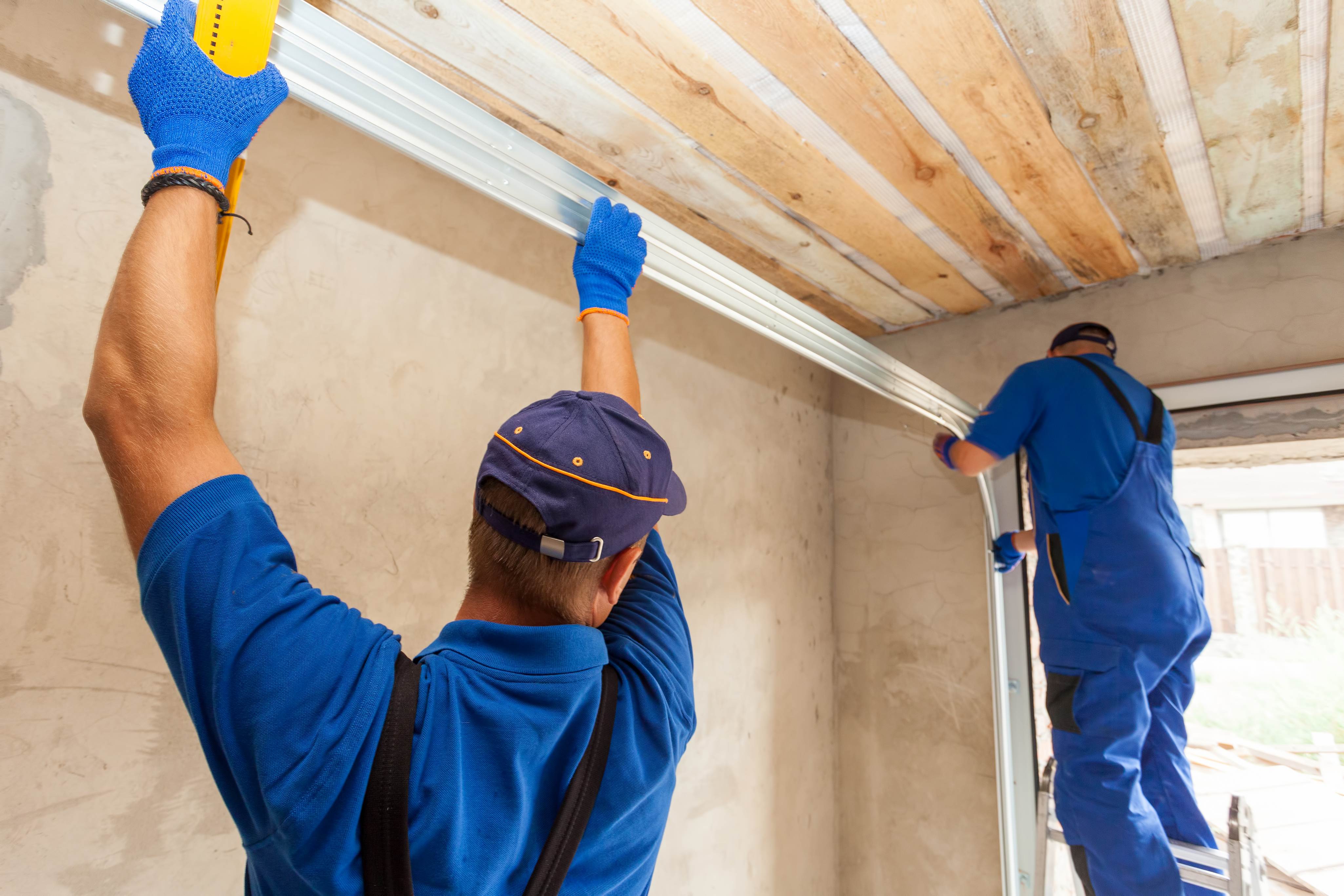 Two Man Working in Garage